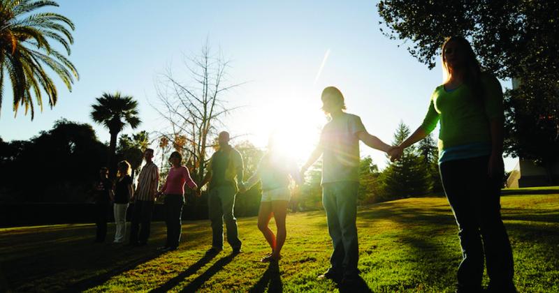 Students standing in the sunlight